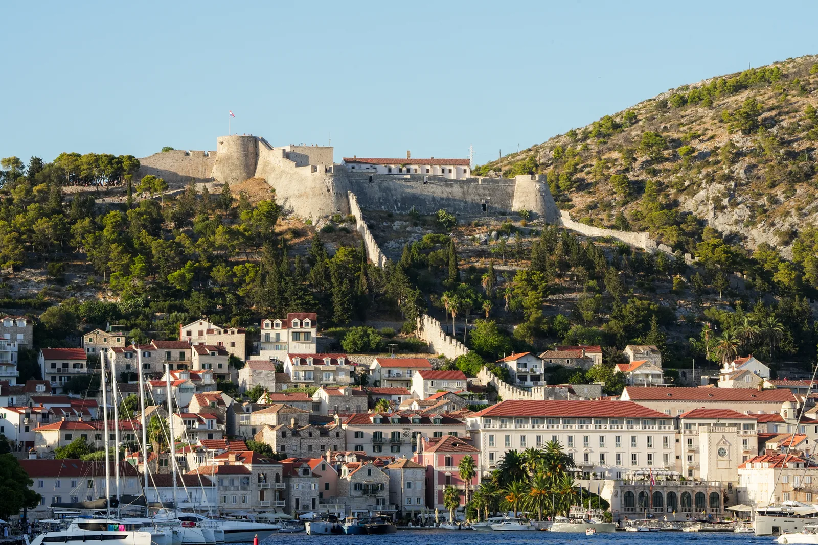 Hvar Town below its fortress, seen from the sea
