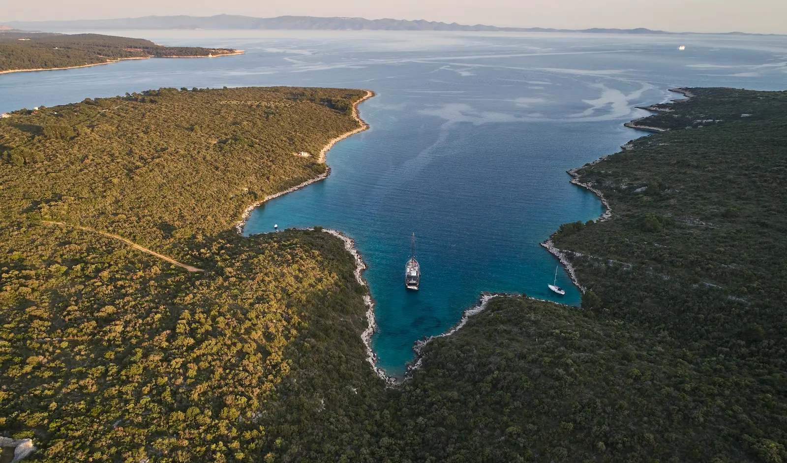 Rara Avis anchored alone in a secluded Croatian cove