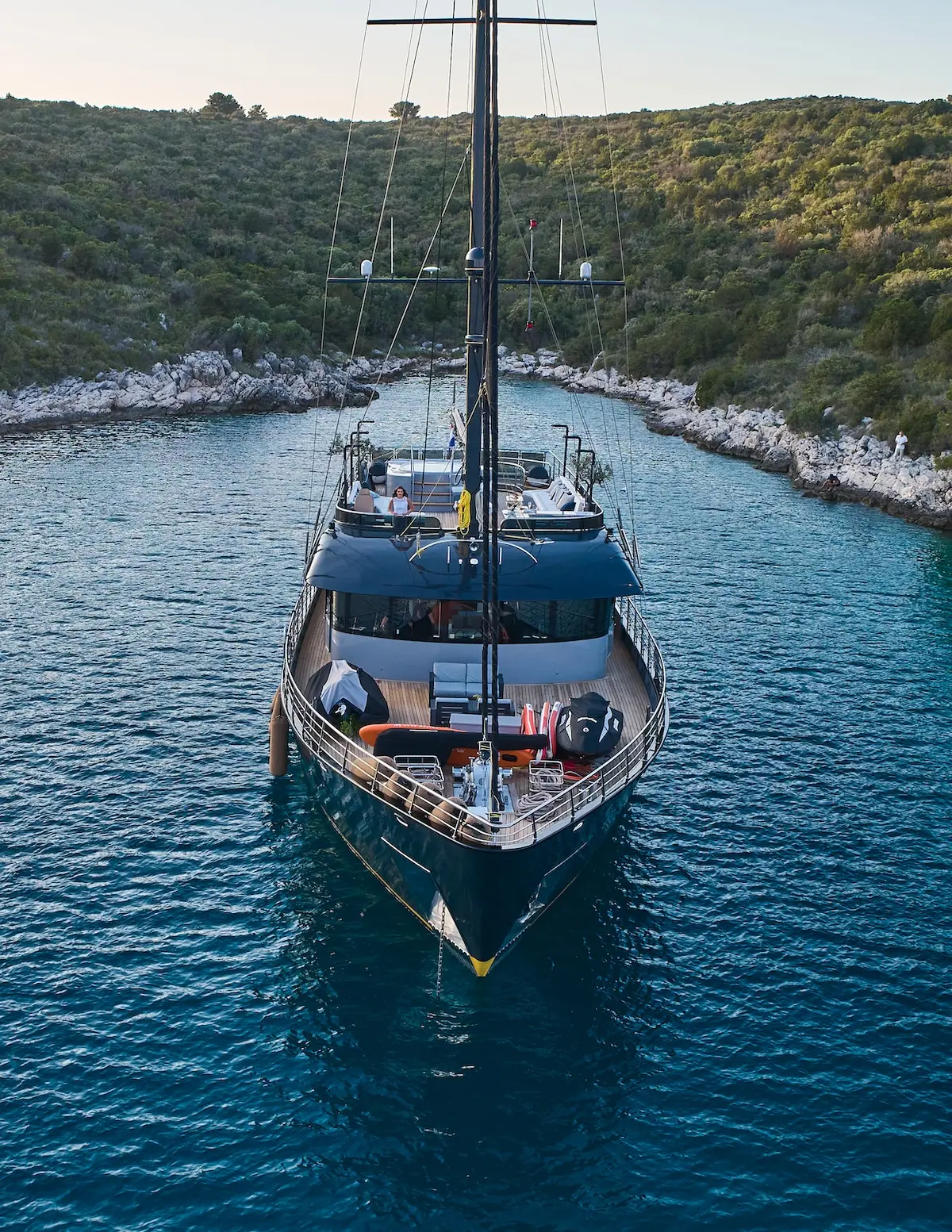 Bow of Rara Avis tucked into a steep, narrow Croatian cove