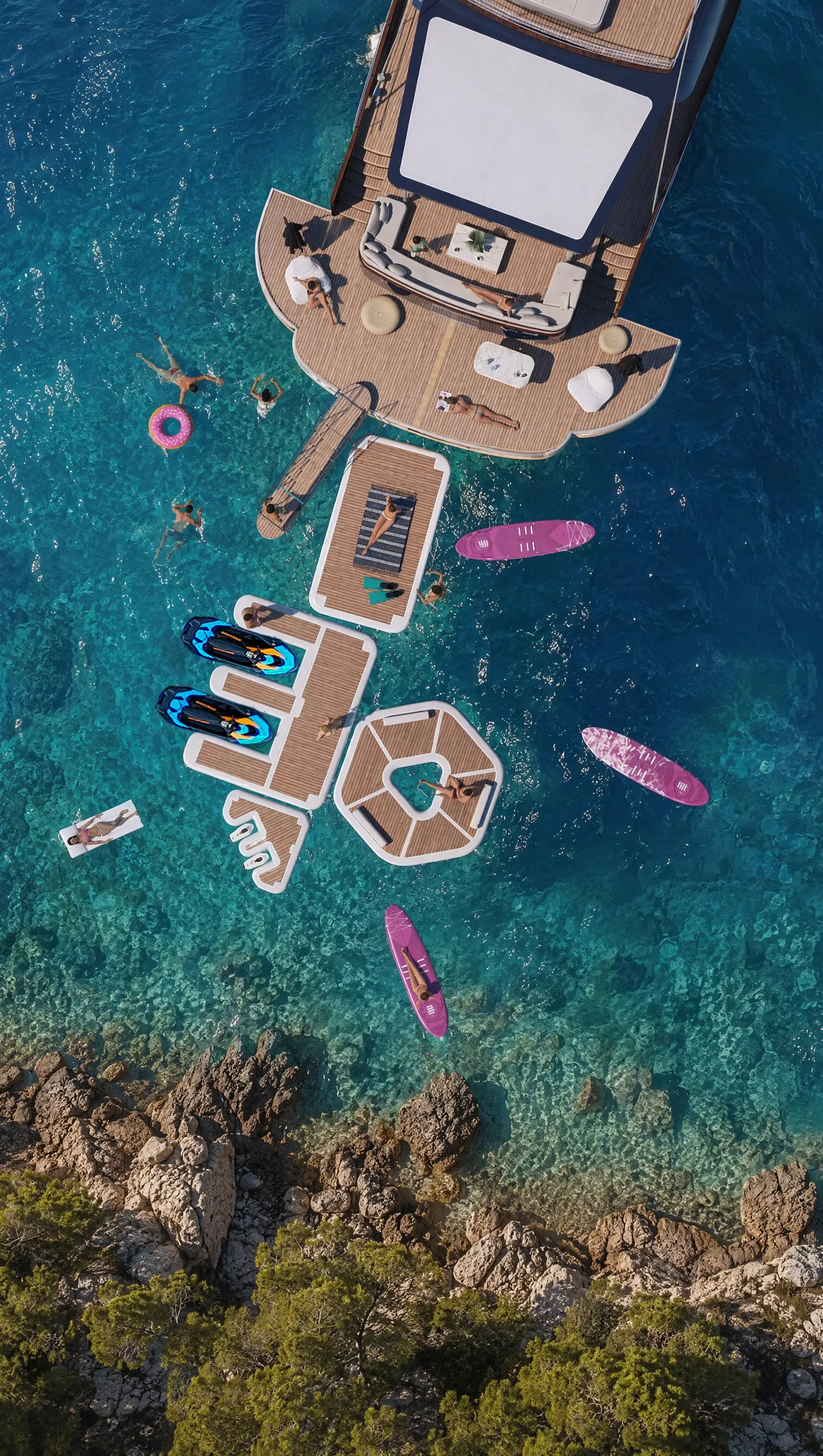 Aerial design render of the stern platform, gangway, jet skis and floating YACHTBEACH platforms